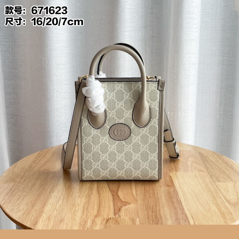 G*u*i top handle bags
